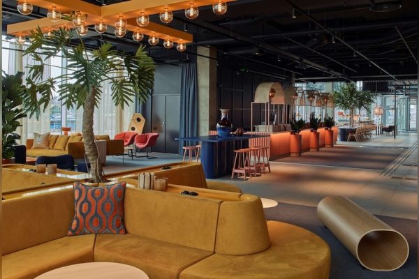 Open coworking space with seating areas and high ceilings in Gothenburg